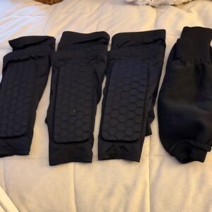Kids Black Padded Sports soccer shin guards one pair sleeves 4 pairs all togethe